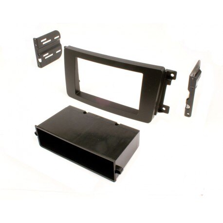 Black plastic car stereo installation dash kit with mounting brackets and storage pocket